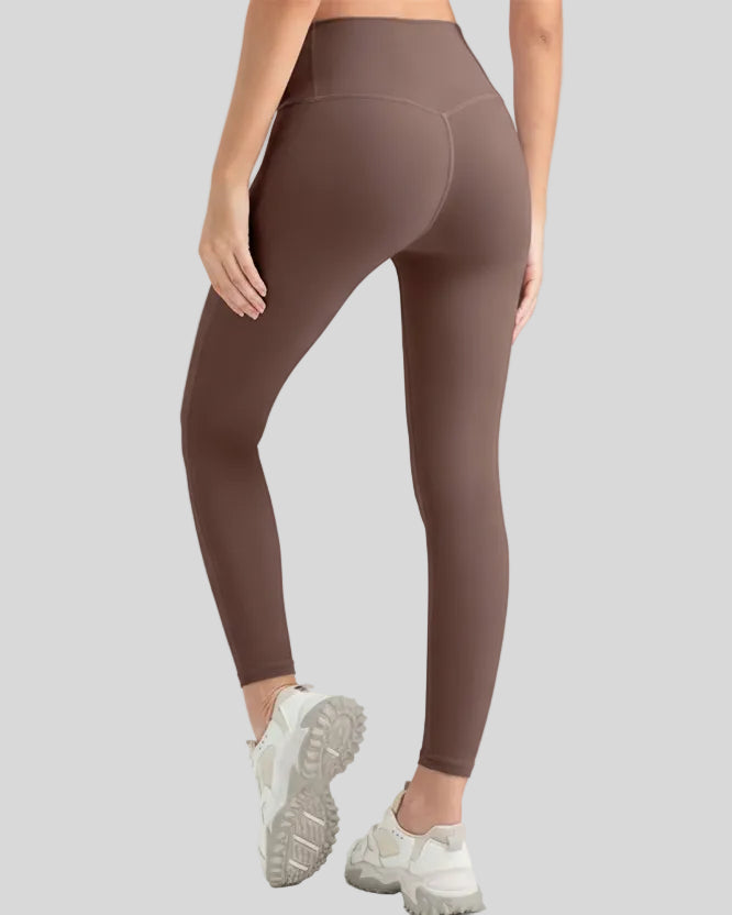 Angled back view of Athlesi StrideSculpt Slim legging in mocha