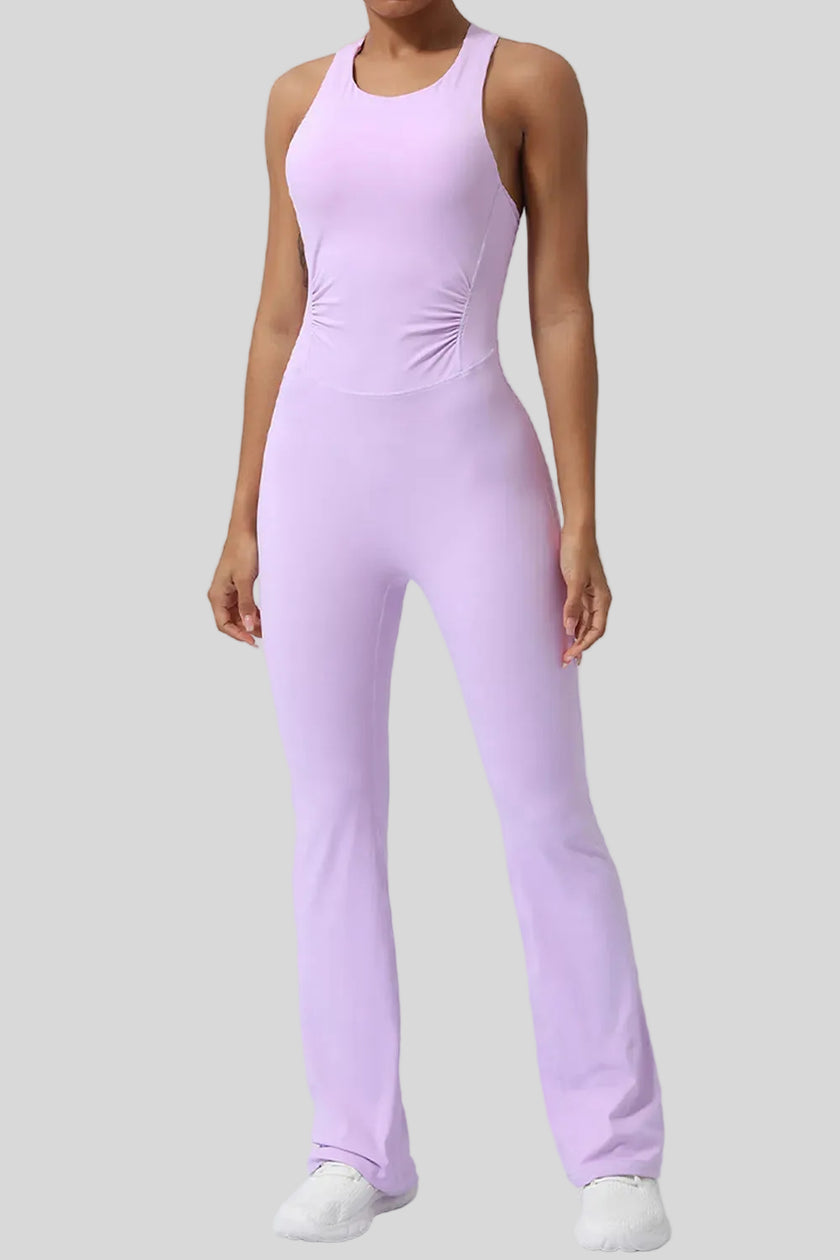 Athlesi StudioCross Sculpt & Flow Jumpsuit in blush pink with wide straps and sculpting fit, front view