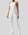 Athlesi StudioCross Sculpt & Flow Jumpsuit in white with wide straps and sculpting fit, front view