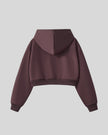 Back view of StudioEase Cropped Hoodie in Dark Reddish Purple with oversized hood