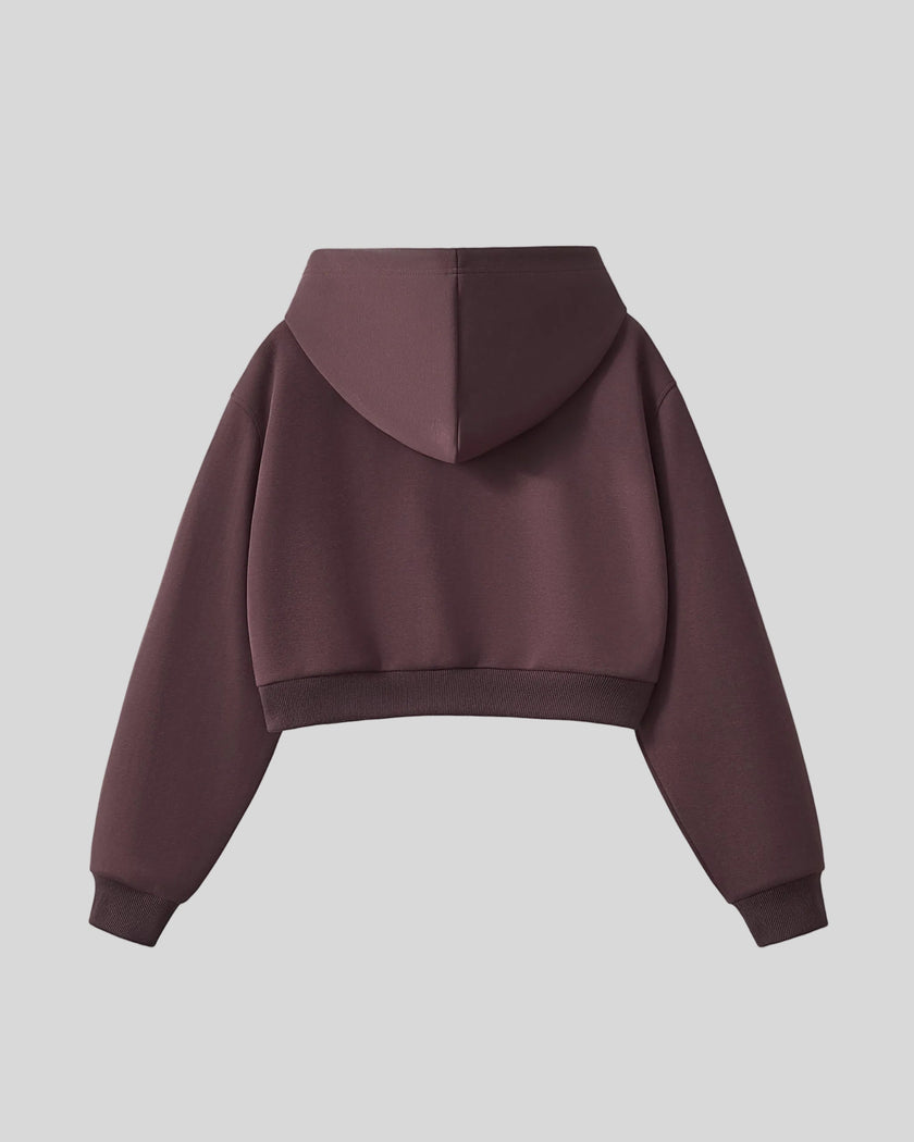 Back view of StudioEase Cropped Hoodie in Dark Reddish Purple with oversized hood