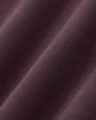 Closeup of Dark Reddish Purple cotton-blend fabric on StudioEase Cropped Hoodie
