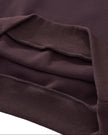 Closeup of wide ribbed hem and cropped construction on StudioEase Cropped Hoodie