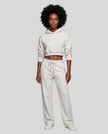 Full body front view of woman wearing Flower Gray StudioEase Cropped Hoodie with matching sweatpants