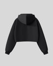 Back view of StudioEase Cropped Zip Hoodie in Black with relaxed hood
