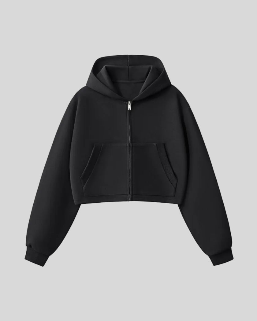 Front view of StudioEase Cropped Zip Hoodie in Black with full zipper and front pockets