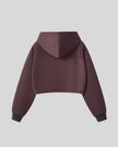 Back view of StudioEase Cropped Zip Hoodie in Dark Reddish Purple with relaxed hood