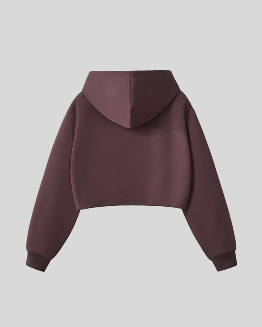 Back view of StudioEase Cropped Zip Hoodie in Dark Reddish Purple with relaxed hood
