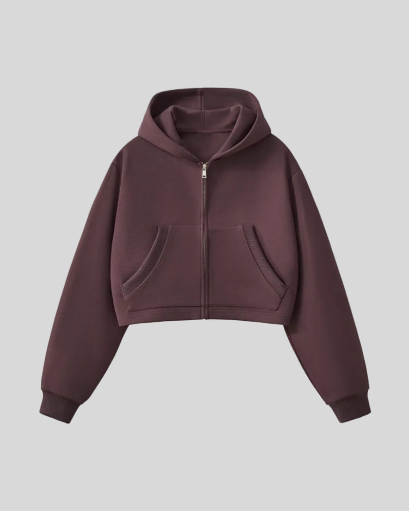 Front view of StudioEase Cropped Zip Hoodie in Dark Reddish Purple with full zipper and front pockets
