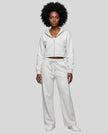 Full body front view of woman styling StudioEase Cropped Zip Hoodie with matching high-waisted sweatpants in Flower Gray