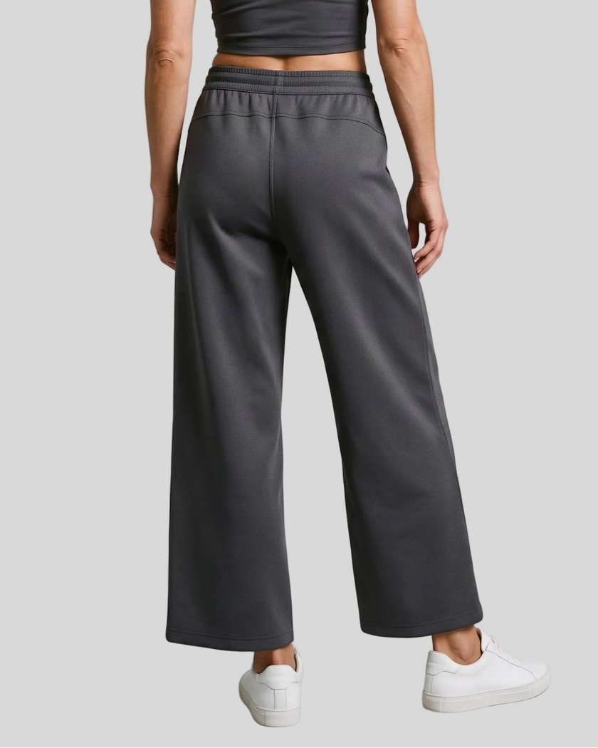 Lower body back view of woman wearing StudioEase Straight-Leg Sweatpants in Charcoal Gray