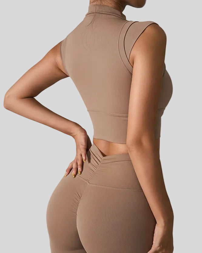 StudioLine High-Neck Tank in camel, back view showing minimalist cropped silhouette