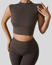 StudioLine High-Neck Tank in mocha, front view showing cropped fit and high neckline