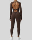 StudioTwist open-back jumpsuit in chocolate showing twisted back design