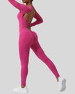 StudioTwist long sleeve jumpsuit in hot pink, side view