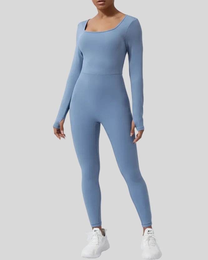 StudioTwist open-back long sleeve jumpsuit in light blue, front view