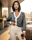 Lifestyle view of black cropped cardigan layered over activewear for elevated casual styling