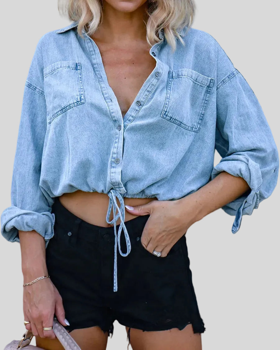 TieForm Denim Top in light blue front view with button front and adjustable tie hem