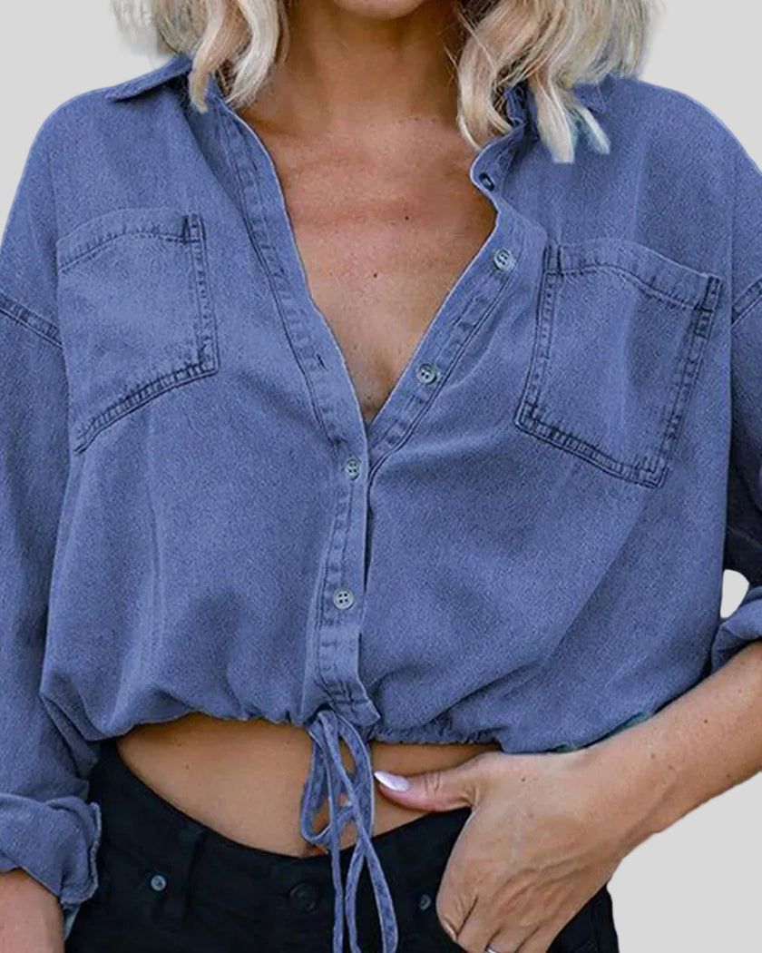 Close-up of TieForm Denim Top showing button front detail and chest pockets