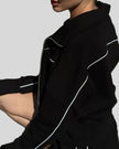 Back view of Athlesi TrackEase jacket and shorts set in black