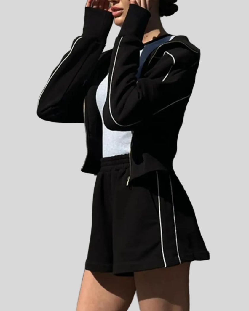 Side view of Athlesi black TrackEase jacket and shorts set