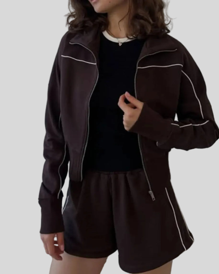 Model wearing Athlesi TrackEase jacket and shorts set in brown front view