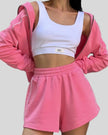 Close-up of Athlesi hot pink TrackEase jacket with contrast piping detail
