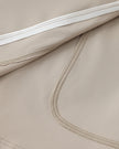 Closeup of the stretch performance fabric on the Athlesi TrackLine A-Line Skirt in light coffee
