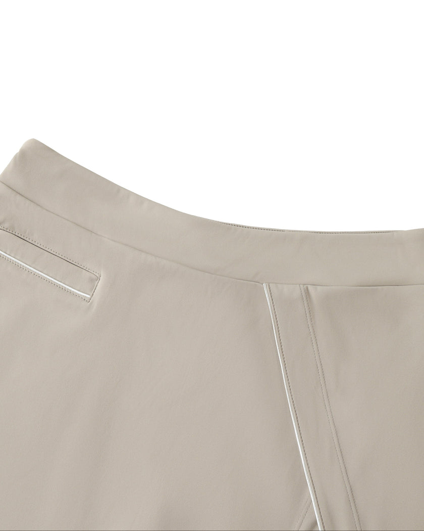Front waistband closeup of the Athlesi TrackLine A-Line Skirt in light coffee