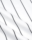 Detailed view of the smooth polyester knit and vertical stripes of the Athlesi TrackLine Baseball Striped Jersey