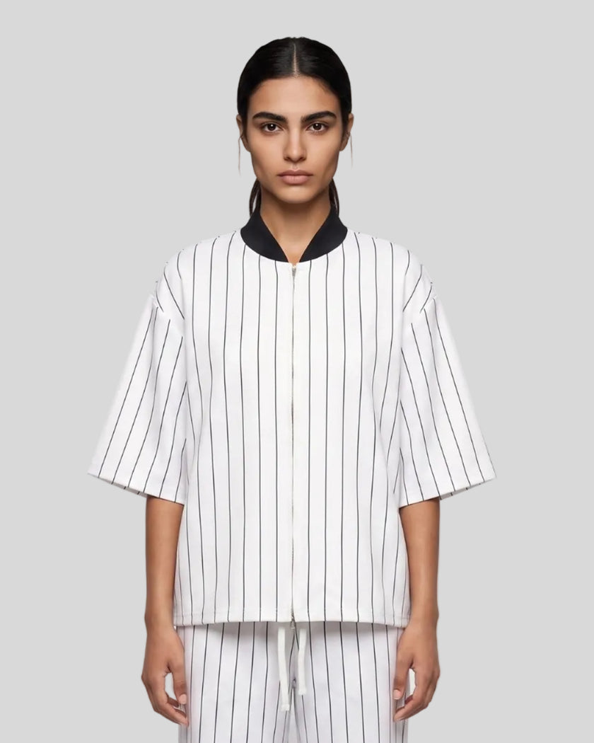 Model wearing the Athlesi TrackLine Baseball Striped Jersey in white, front view
