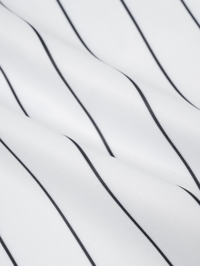 Close-up of the white and black pinstripe fabric on the Athlesi TrackLine Baseball Striped Shorts