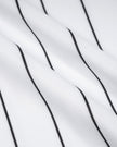 Close-up of the smooth midweight knit fabric and vertical pinstripe pattern on the TrackLine Baseball Striped Tee.