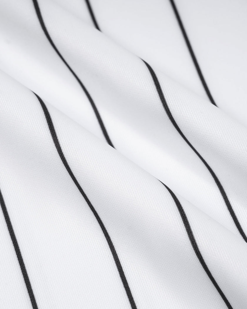 Close-up of the smooth midweight knit fabric and vertical pinstripe pattern on the TrackLine Baseball Striped Tee.