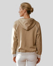 Model wearing TrackLine Club Hoodie in Khaki back view