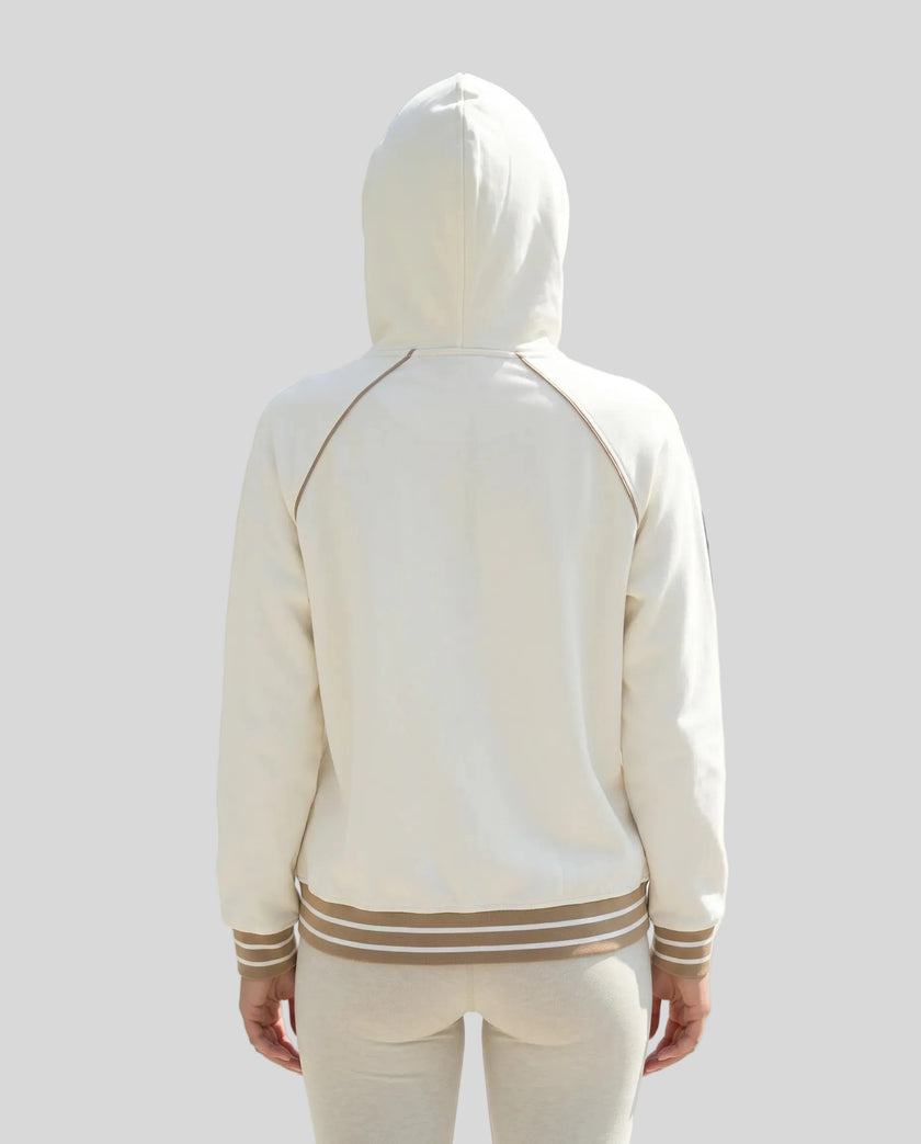 Model wearing TrackLine Club Hoodie in Mild Apricot back view