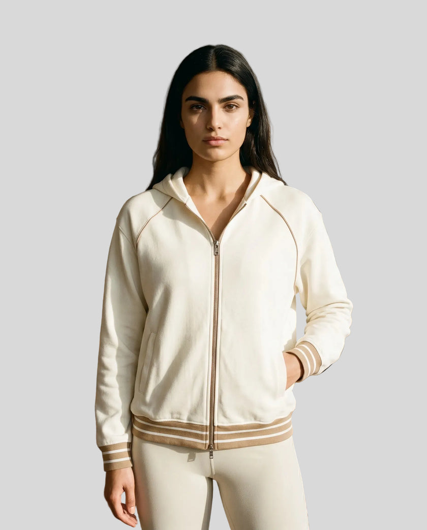 Model wearing TrackLine Club Hoodie in Mild Apricot fully zipped front view