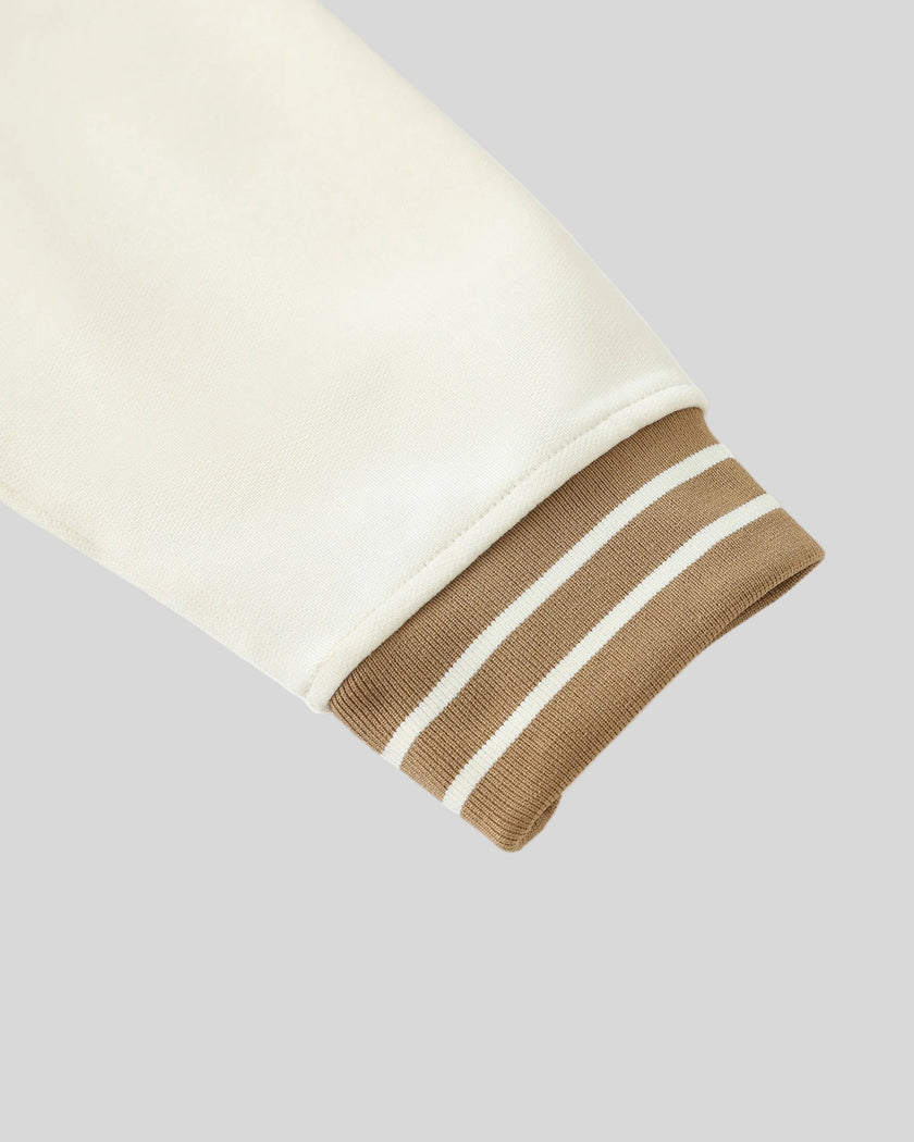 Sleeve and striped cuff detail of TrackLine Club Hoodie in Mild Apricot