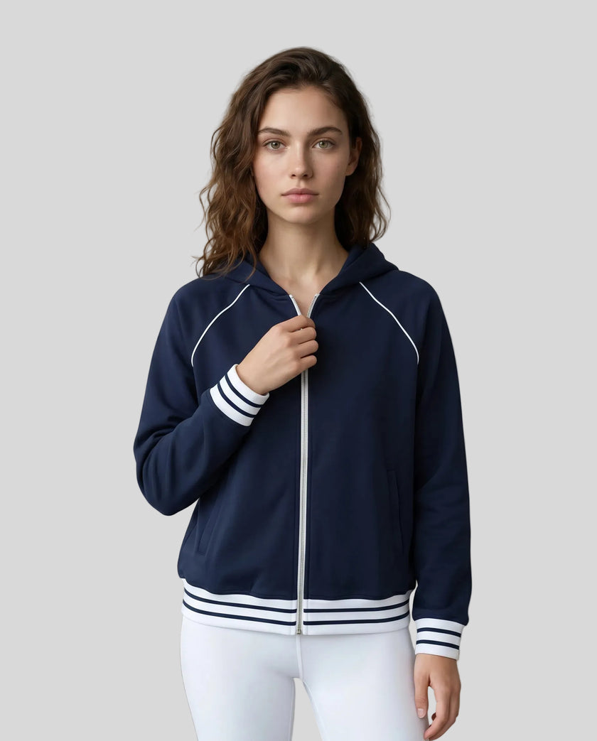 Model wearing TrackLine Club Hoodie in Navy Blue fully zipped front view