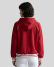 Model wearing TrackLine Club Hoodie in Red back view