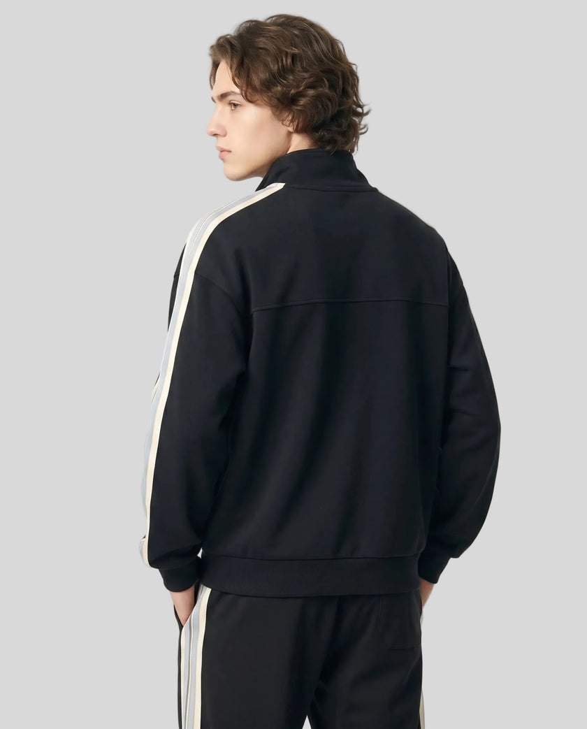 Woman Model wearing TrackLine Club Jacket in Black back view