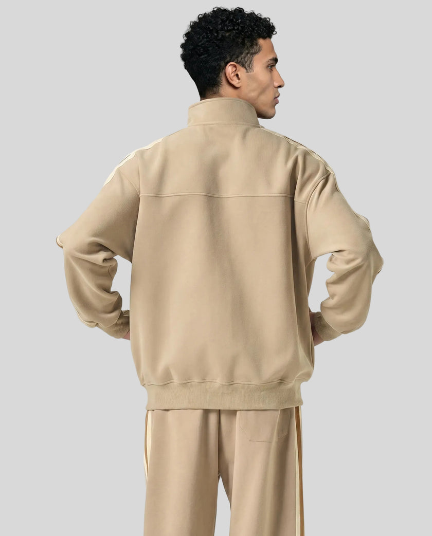 Model wearing TrackLine Club Jacket in Khaki back view