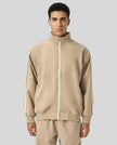 Model wearing TrackLine Club Jacket in Khaki fully zipped front view
