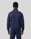 Model wearing TrackLine Club Jacket in Royal Blue back view