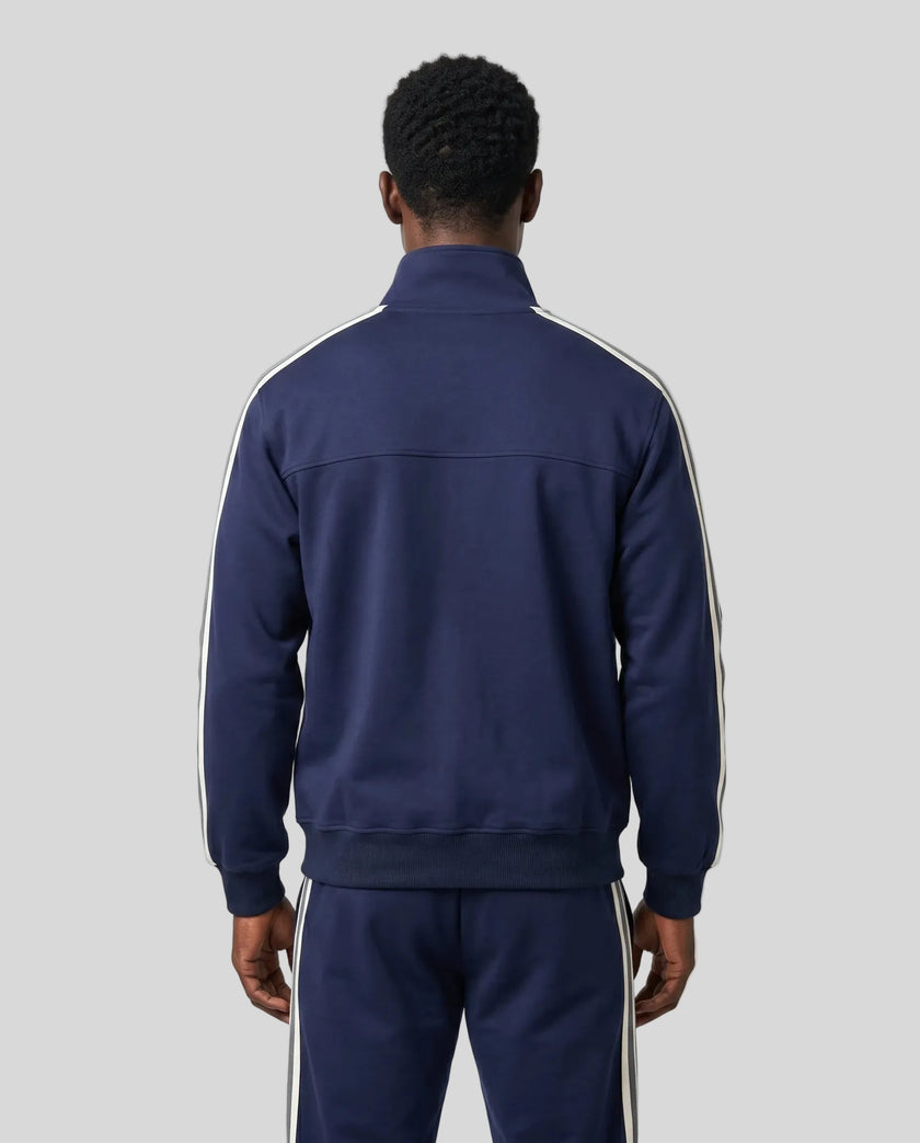 Model wearing TrackLine Club Jacket in Royal Blue back view