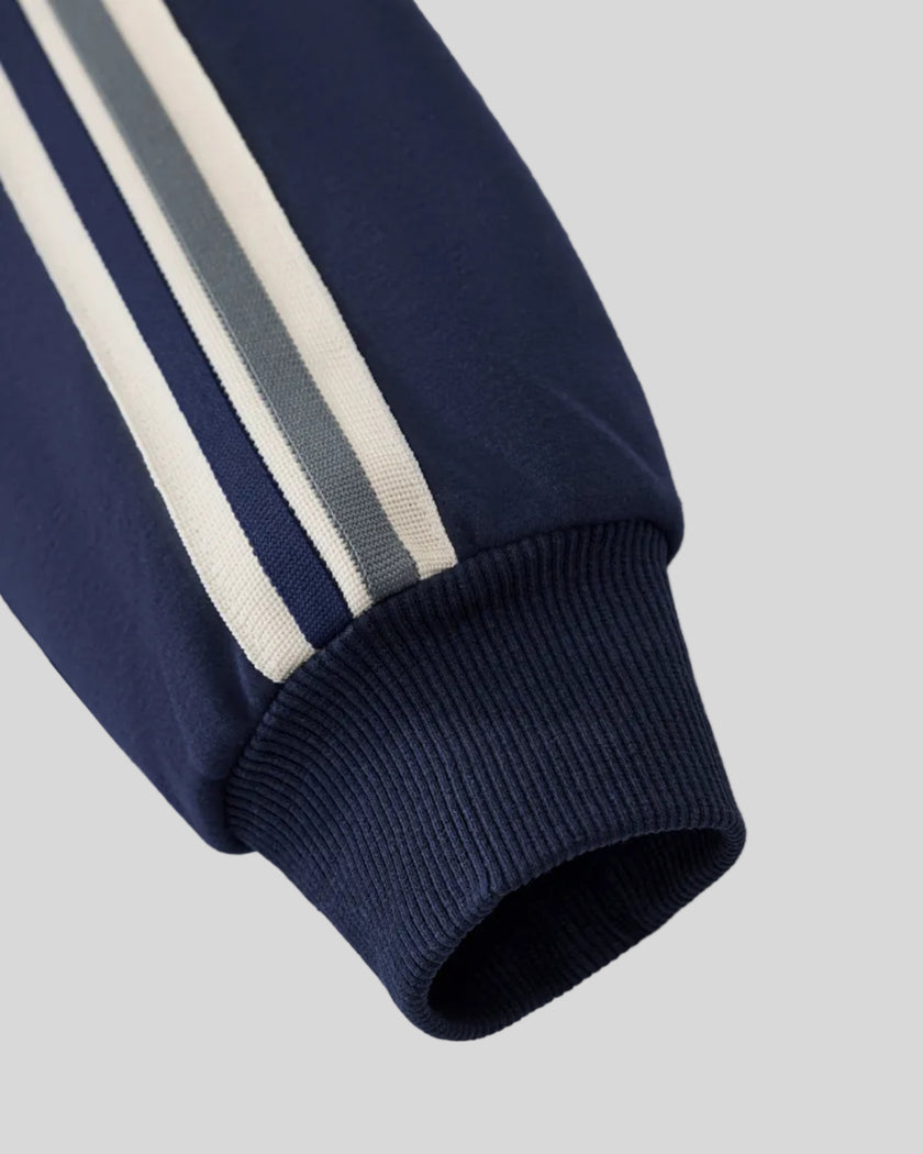 Contrast stripe sleeve detail of TrackLine Club Jacket in Royal Blue