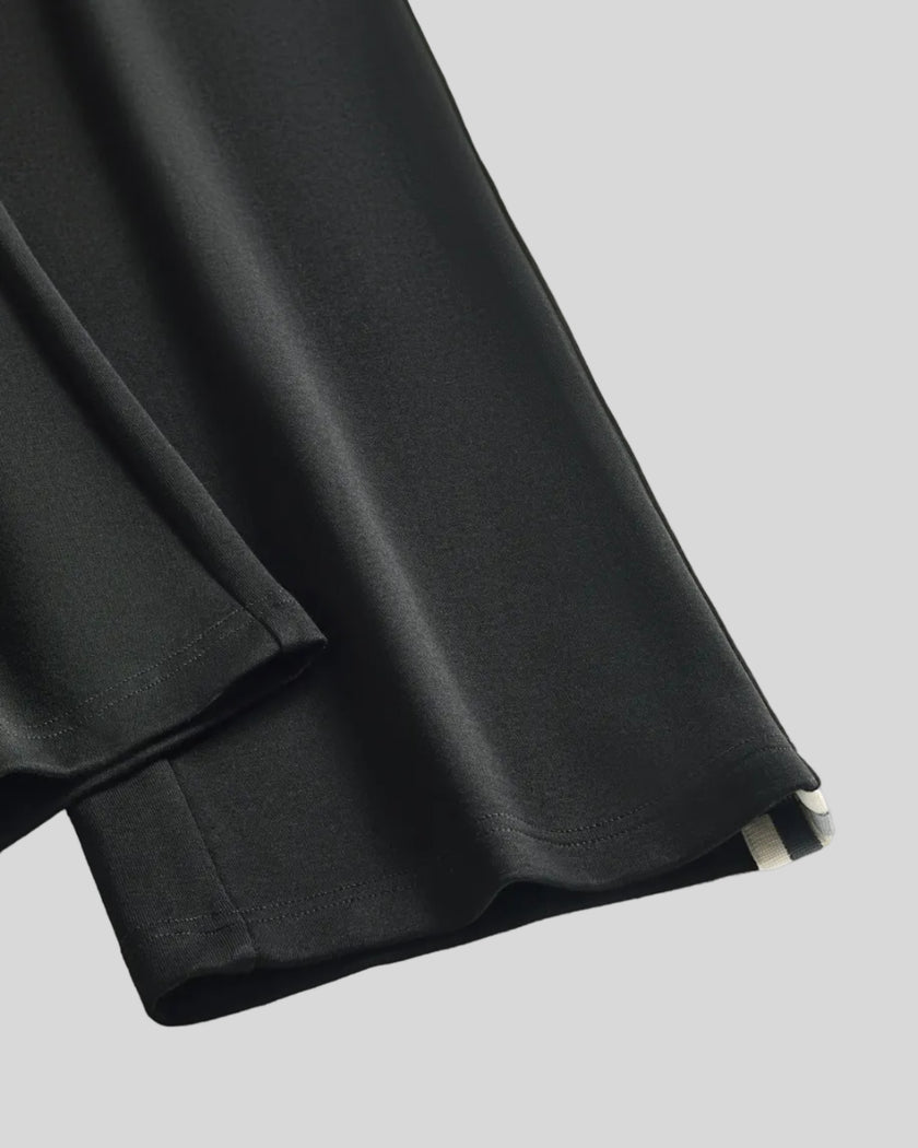 Leg hem detail of TrackLine Club Pants in Black