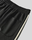 Back waistband and pocket detail of TrackLine Club Pants in Black