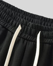 Drawstring waistband detail of TrackLine Club Pants in Black