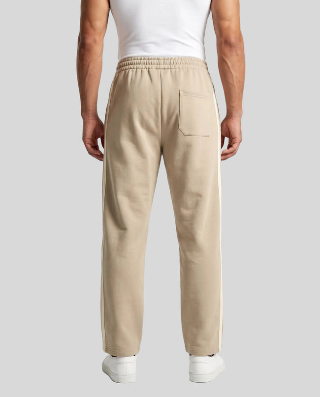 Model wearing TrackLine Club Pants in Khaki back view
